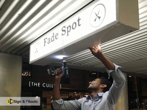 under awning sign, light box sign, sign installation