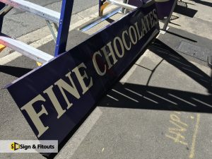 Banner sign, fabricated sign