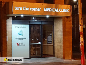 backlit sign, illuminated sign, Building sign