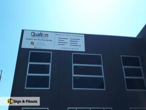Panel sign, Business sign, building signage
