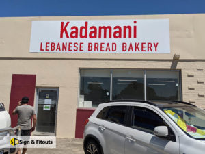 Panel sign, Business sign, building signage