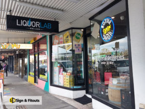 under awning sign, light box sign, shop sign