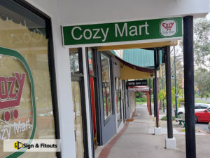 under awning sign, light box sign, shop signage