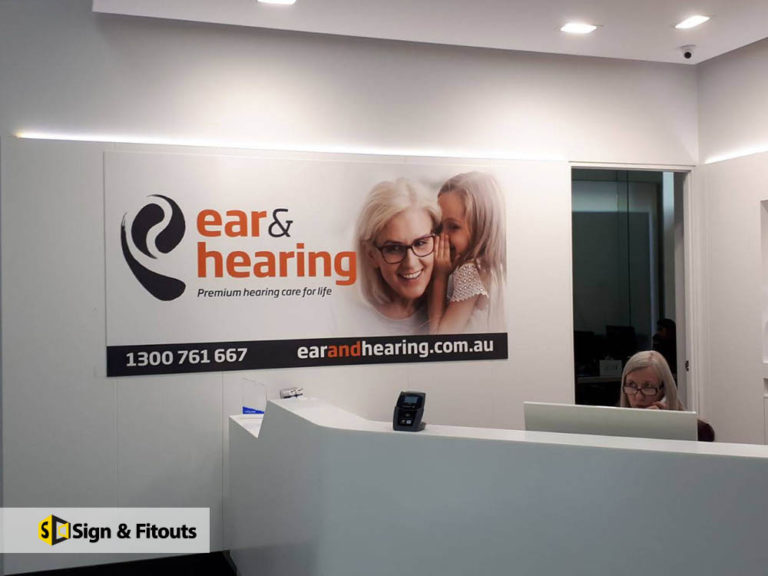 Reception sign, wall graphics, office signage